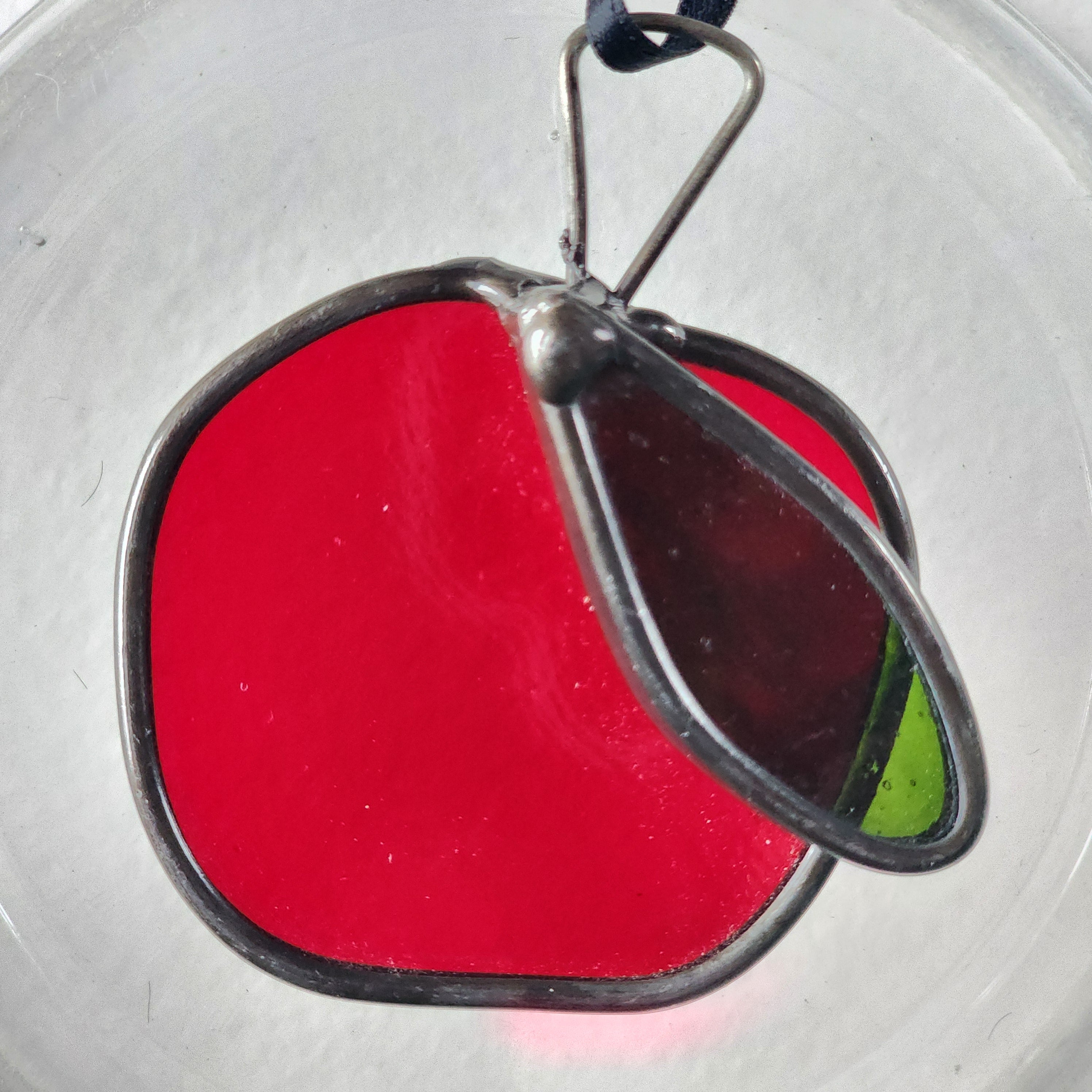 Stained glass red apple suncatcher with green leaf