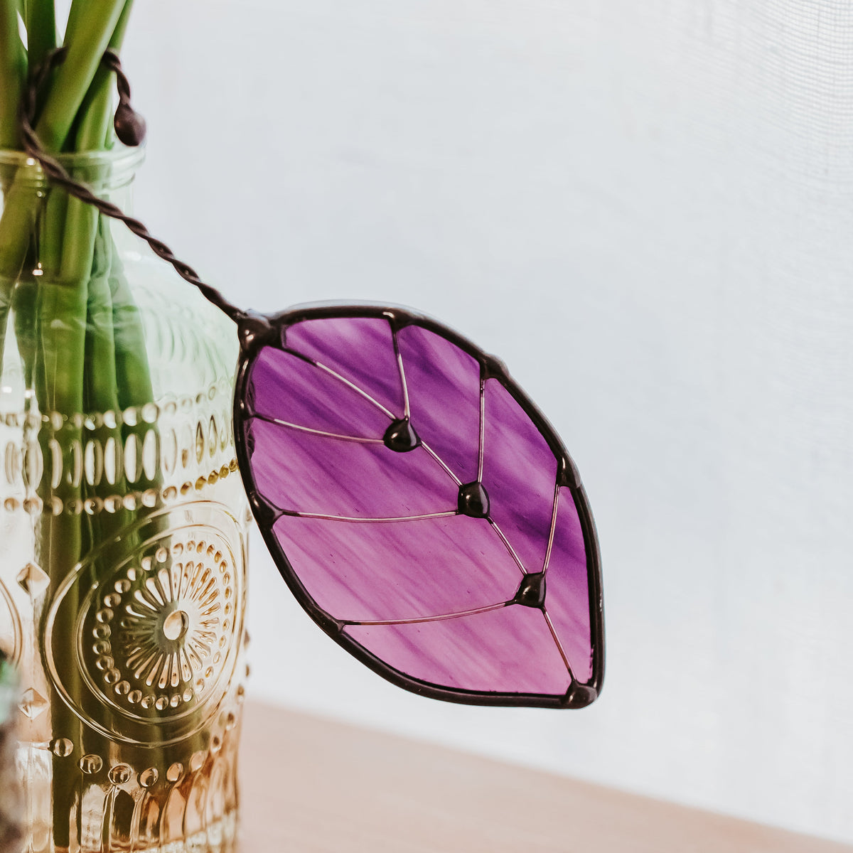 Purple wispy stained glass leaf suncatcher by Thomas Critchlow Art Glass